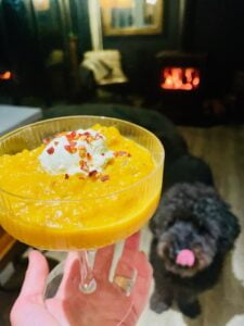 Gluten-Free Roast Pumpkin coconut Soup in a martini glass.